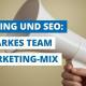 Im Hintergrund ein Megafon, im Vordergrund der Schriftzug "Branding und SEO: Ein starkes Team im Marketing-Mix"